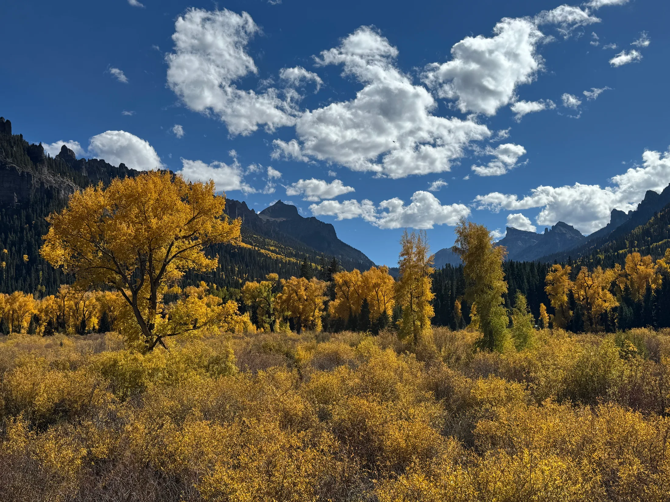 Real autumn valley, mountain silhouettes and clouds from the Picture Corral